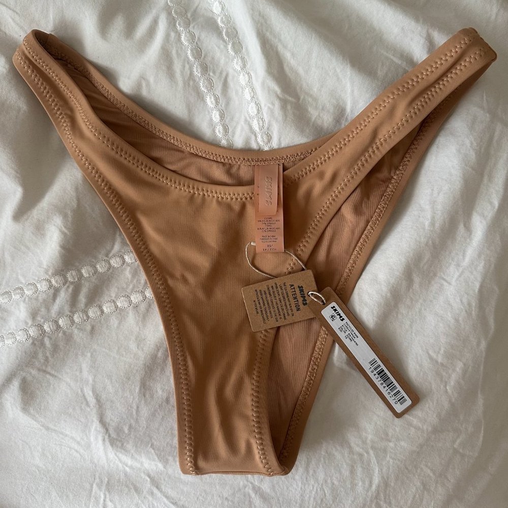 SOLD NWT Skims Swim Tanga XS bikini bottom in ochre